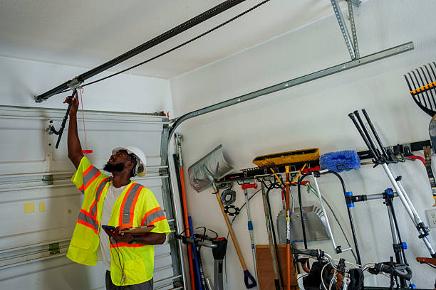Professional Garage Door technician working in McLoud, OK